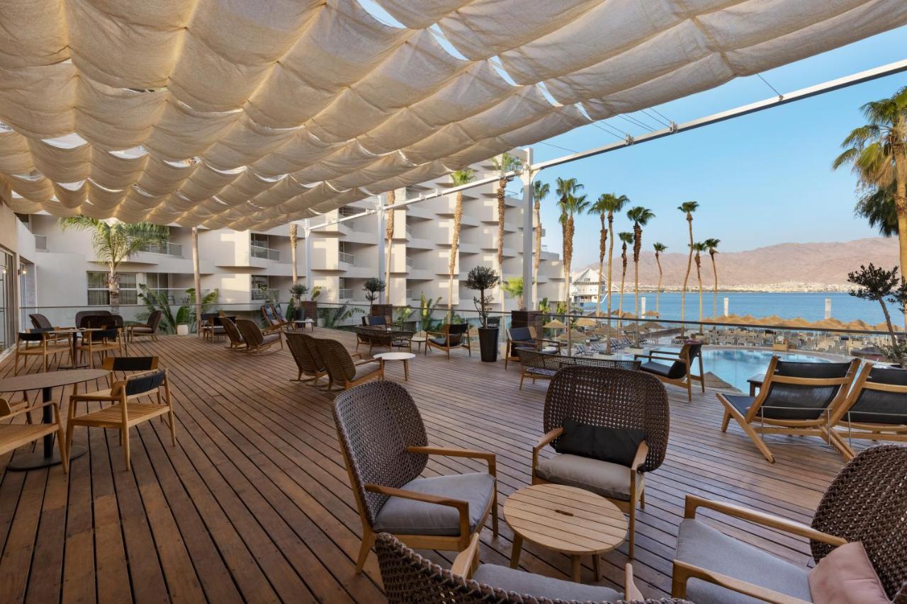 Aria Hotel Eilat Exterior foto The pool deck at the Dead Sea