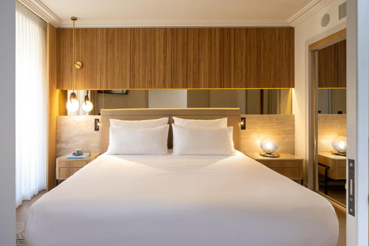 Aria Hotel Eilat Exterior foto A bedroom at the hotel