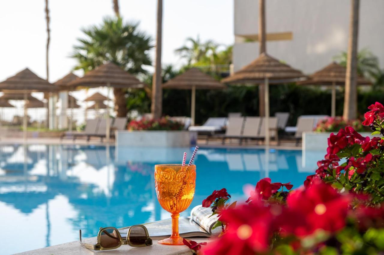 Aria Hotel Eilat Exterior foto A glass of Aperol Spritz